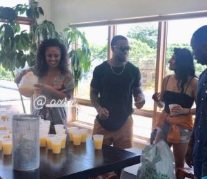 Artist and Taste-maker, Stephanie Morales pouring Mimosa's at Breaks N Eggs
